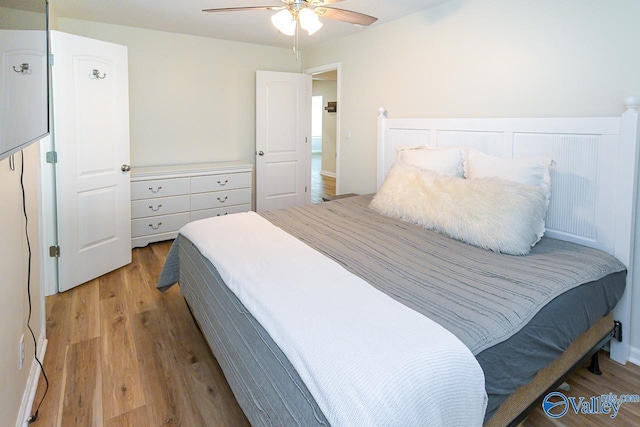 1409 8th Ave SE, Decatur, AL 35601 - bedroom featuring wood finished floors and ceiling fan