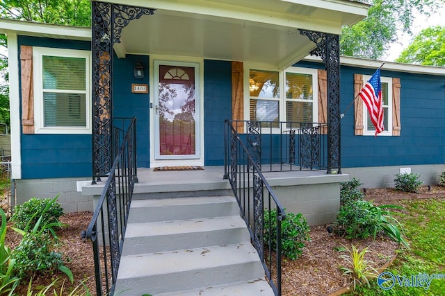 1409 8th Ave SE, Decatur, AL 35601 - view of exterior entry with crawl space and covered porch