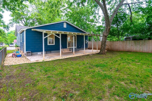 1409 8th Ave SE, Decatur, AL 35601 - rear view of property featuring a patio area and crawl space