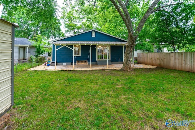 1409 8th Ave SE, Decatur, AL 35601 - rear view of property with a patio area