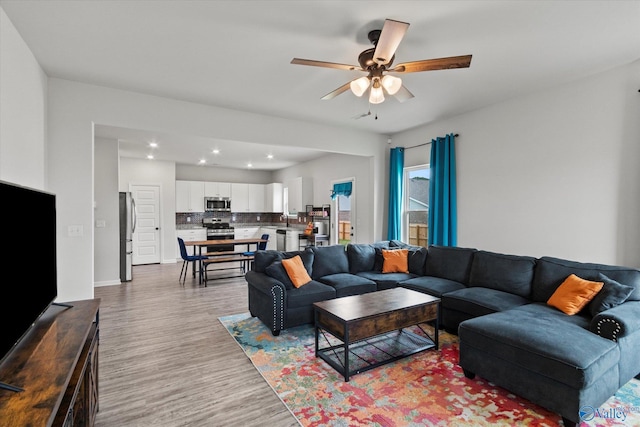 18577 Cottontail Ln, Athens, AL 35613 - living room with a ceiling fan, baseboards, recessed lighting, and wood finished floors