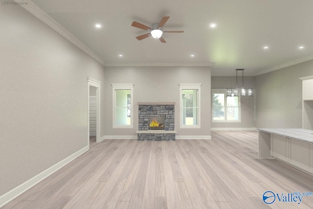 unfurnished living room featuring light wood-type flooring, ceiling fan, plenty of natural light, and a stone fireplace