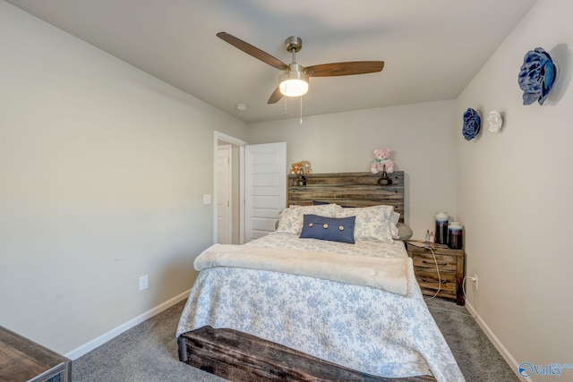 bedroom with a ceiling fan, baseboards, and carpet floors