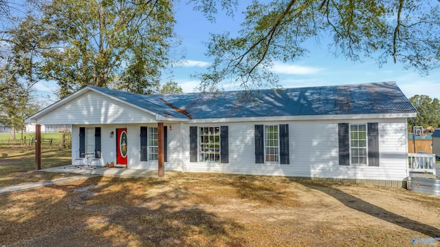 single story home featuring covered porch