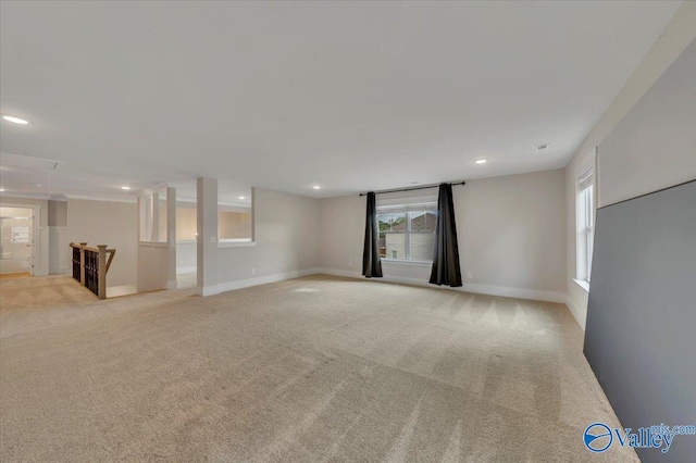 interior space with baseboards, recessed lighting, and carpet