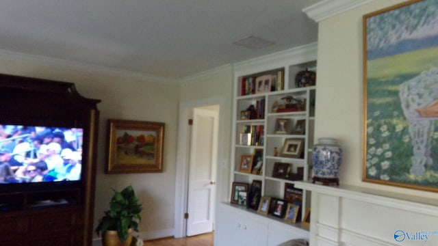 interior space featuring crown molding