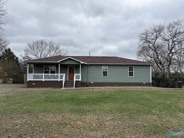 ranch-style house with a porch and a front yard