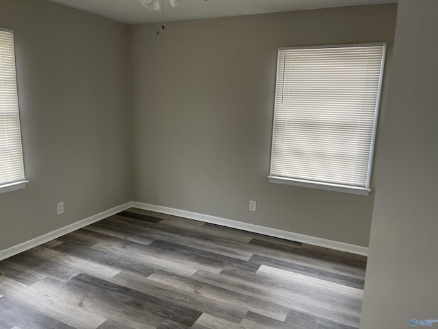 4503 Kenwood Dr, Huntsville, AL 35810 - unfurnished room featuring baseboards, a ceiling fan, and dark wood-style floors