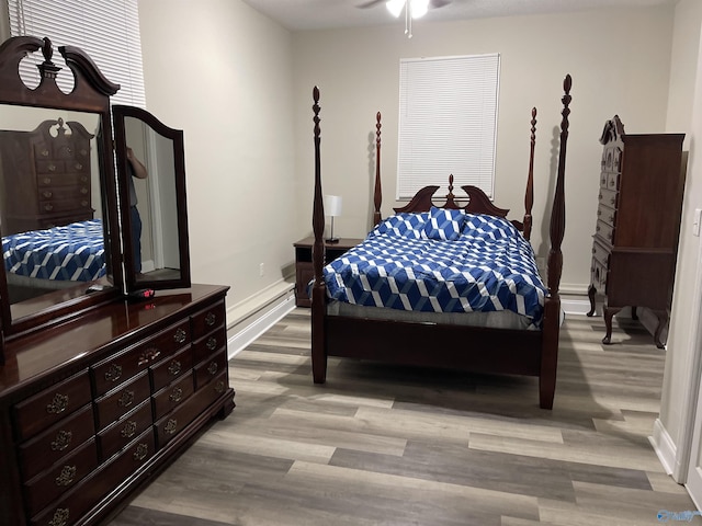 4503 Kenwood Dr, Huntsville, AL 35810 - bedroom featuring baseboards and wood finished floors
