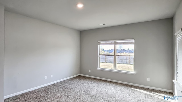 view of carpeted spare room