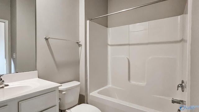 full bathroom with vanity, toilet, and shower / bathtub combination