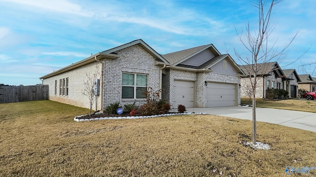 ranch-style house with a garage and a front lawn