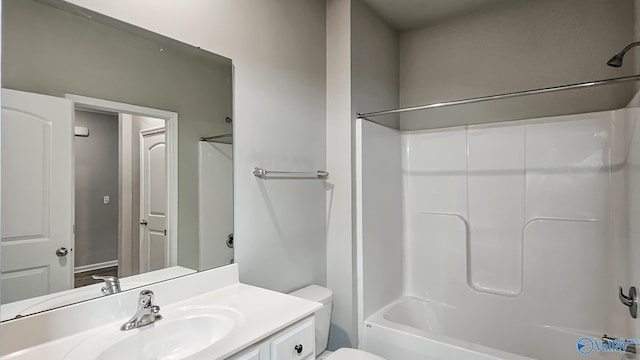 full bathroom featuring vanity, shower / bathtub combination, and toilet