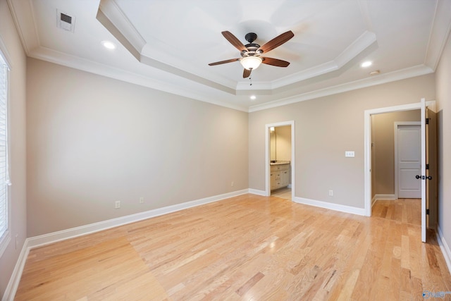 22222 Merlot Dr, Athens, AL 35613 - unfurnished bedroom with a tray ceiling, light wood-type flooring, visible vents, recessed lighting, and ornamental molding