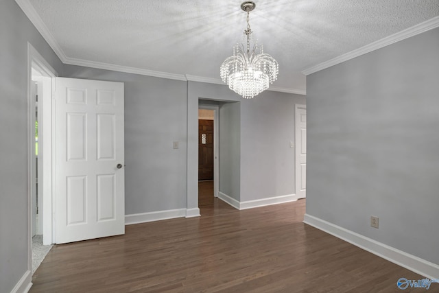 interior space with dark wood-type flooring, crown molding, baseboards, and a textured ceiling