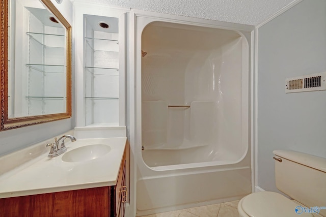 bathroom featuring vanity, visible vents, a textured ceiling, tile patterned floors, and toilet