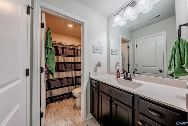 207 Jubilee Cir SE, Huntsville, AL 35803 - bathroom featuring vanity, marble finish floors, and a shower with curtain