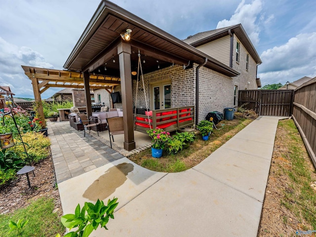 207 Jubilee Cir SE, Huntsville, AL 35803 - fenced backyard with an outdoor living space, a patio area, and french doors