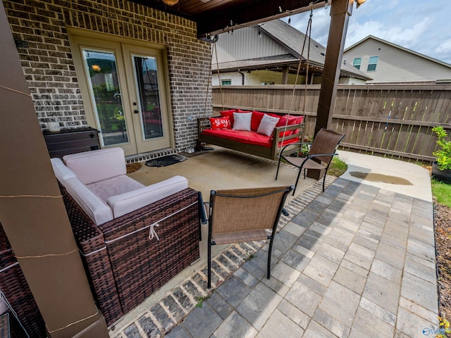 207 Jubilee Cir SE, Huntsville, AL 35803 - view of patio / terrace featuring french doors and outdoor lounge area