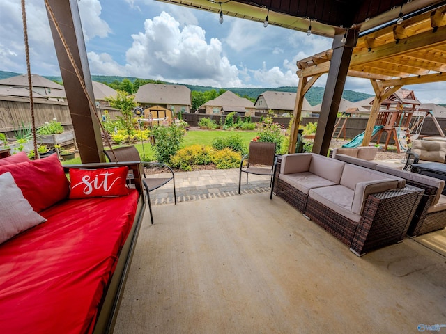 207 Jubilee Cir SE, Huntsville, AL 35803 - fenced backyard with an outdoor hangout area, a patio area, a residential view, and a playground