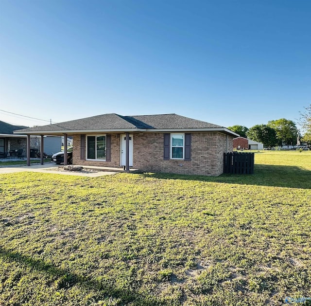 26 Prospect St, Town Creek, AL 35672 - ranch-style home with brick siding and a front lawn