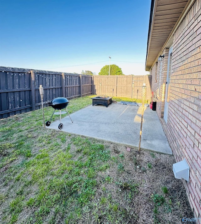 26 Prospect St, Town Creek, AL 35672 - view of yard with a fenced backyard and a patio area