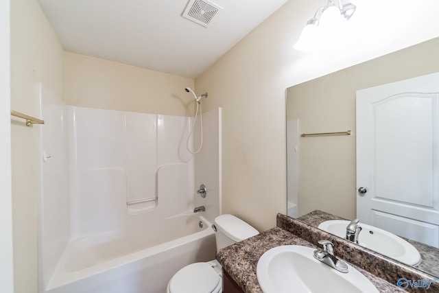 full bathroom with vanity, shower / bathtub combination, and toilet