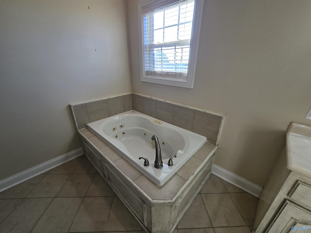 bathroom with tile patterned floors and tiled bath