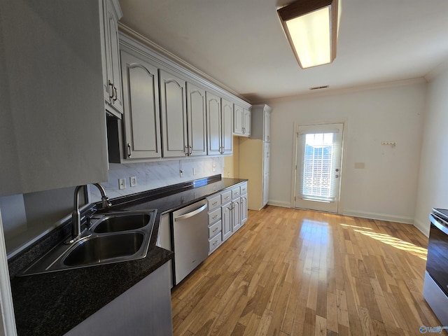 kitchen featuring sink, dishwasher, light hardwood / wood-style floors, and gray cabinetry