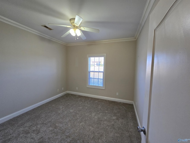 unfurnished room with crown molding, ceiling fan, and dark colored carpet