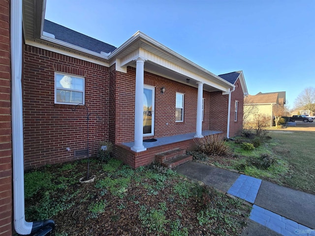 view of home's exterior featuring covered porch