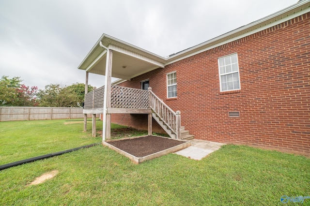 back of house featuring a yard