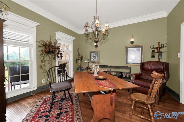 83 James Rd, Hartselle, AL 35640 - dining area featuring wood finished floors, crown molding, and a chandelier