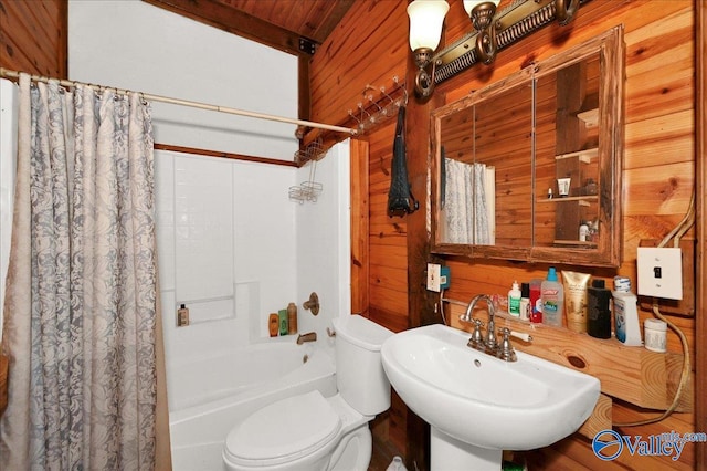 83 James Rd, Hartselle, AL 35640 - bathroom featuring wood walls and shower / bath combo with shower curtain