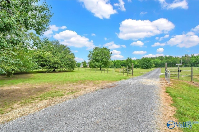 83 James Rd, Hartselle, AL 35640 - view of dirt / gravel road featuring a gated entry