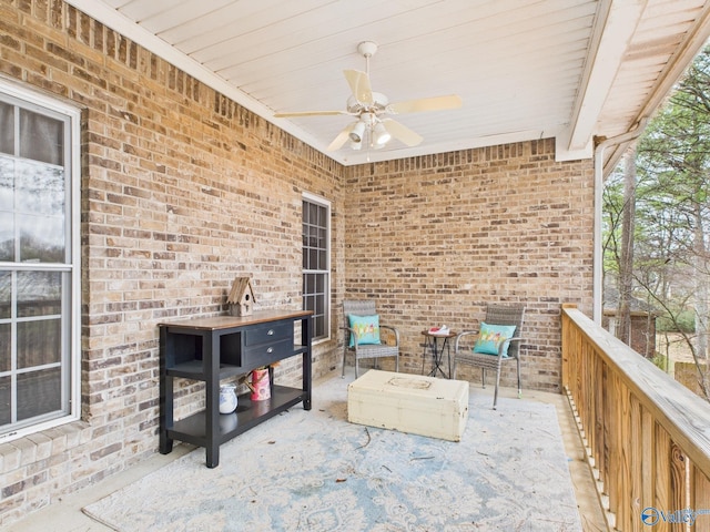 view of patio featuring ceiling fan