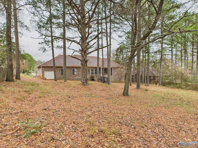 view of yard with an attached garage