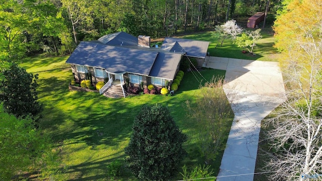 bird's eye view featuring a forest view