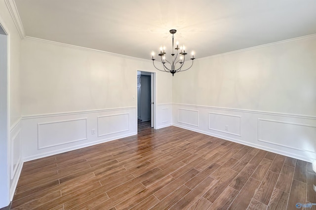 interior space with dark hardwood / wood-style flooring, ornamental molding, and a notable chandelier