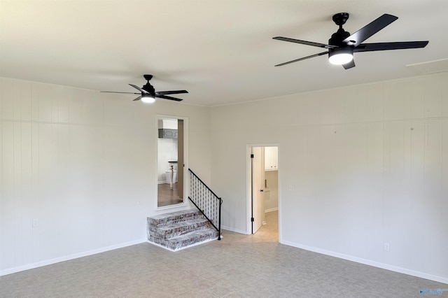 spare room featuring ceiling fan