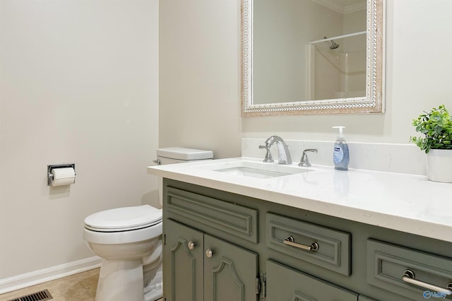 bathroom featuring tile patterned floors, a shower, toilet, vanity, and ornamental molding