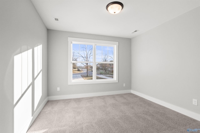 view of carpeted spare room