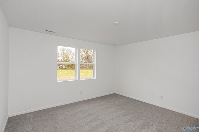 empty room with carpet floors