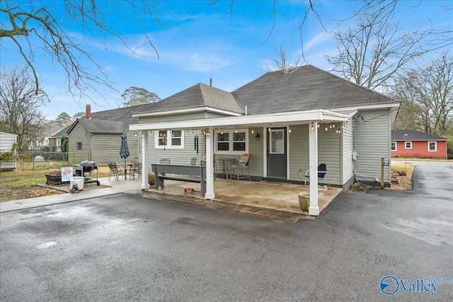 view of front of home with a patio area