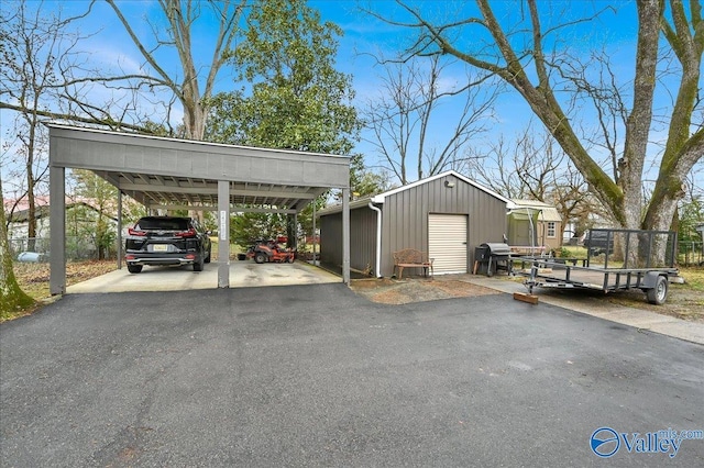 view of car parking with a garage and a carport