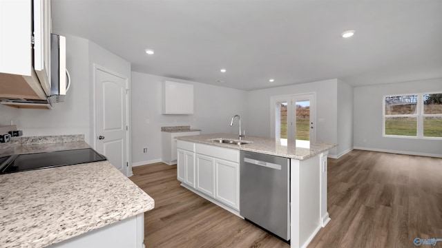 kitchen with a kitchen island with sink, sink, white cabinets, and stainless steel dishwasher