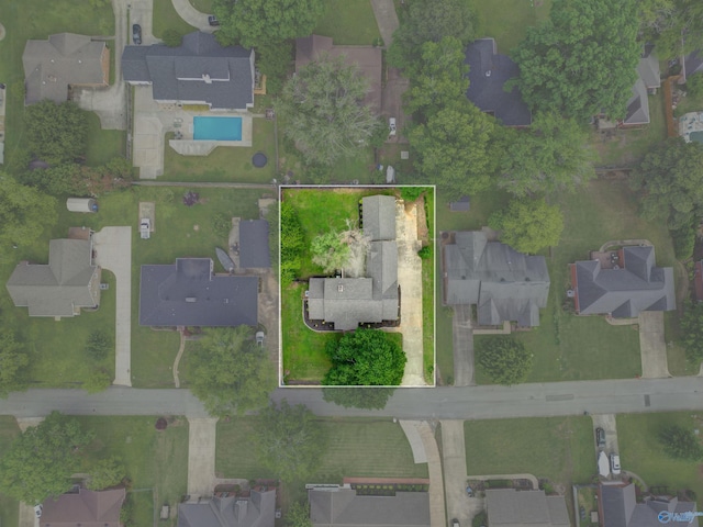 view of property location with nearby suburban area, property boundaries highlighted, and a pool area