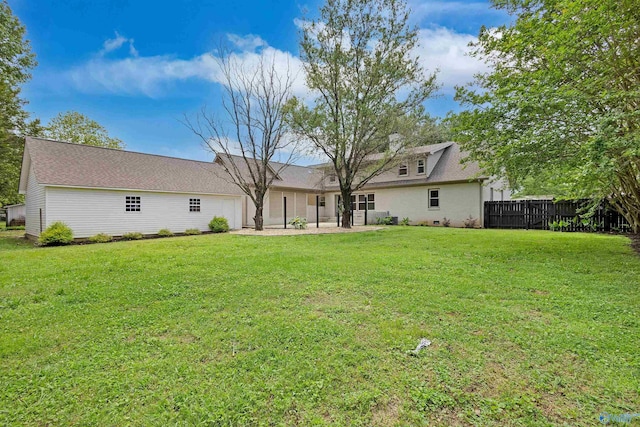 back of property featuring a garage