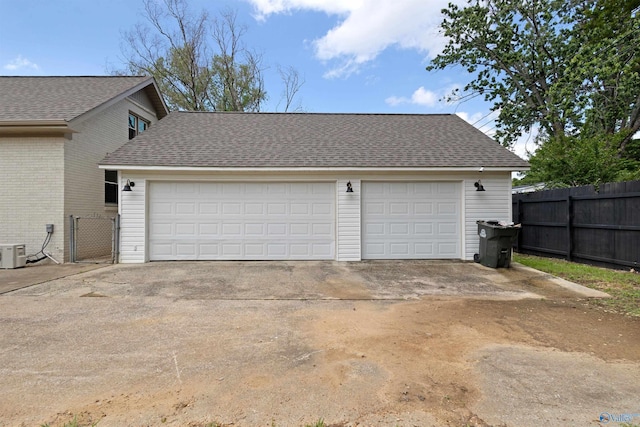 garage featuring fence
