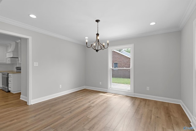 unfurnished room featuring a chandelier, light wood-type flooring, baseboards, ornamental molding, and recessed lighting